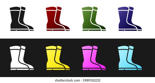 Set Fishing boots icon isolated on black and white background. Waterproof rubber boot. Gumboots for rainy weather, fishing, hunter, gardening.  Vector