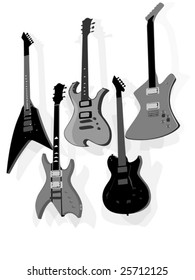 set of five electric guitars hanging