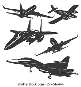 A set of five passenger and military aircraft monochrome, in different positions. Vector illustration