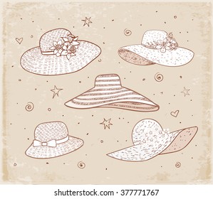 Set of five summer hats on vintage background.