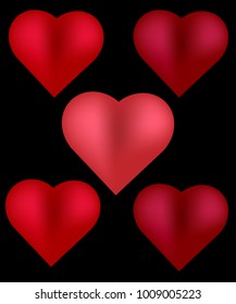 A set of five voluminous red hearts