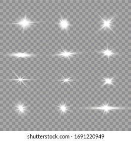 Set of flashes, Lights and Sparkles on a transparent background. Bright gold flashes and glares. Abstract golden lights isolated Bright rays of light. Glowing lines.