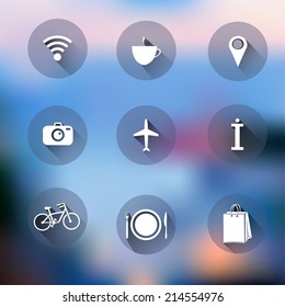 Set of flat design icons on blurred background. 