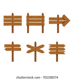 Set of flat style wooden signboards and pointers isolated over white background. Colorful empty signposts collection. Vector flat illustration.