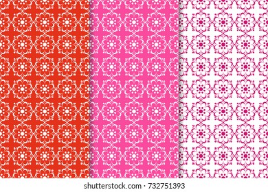 Set of floral colored seamless patterns. Red backgrounds