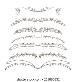 set of floral  decorations. Contains seven different symmetrical elements. Background white.