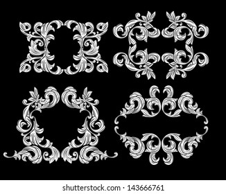 Set of floral design elements isolated on black