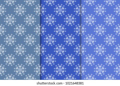 Set of floral ornaments. Blue vertical seamless patterns. Wallpaper backgrounds