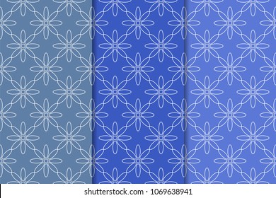 Set of floral ornaments. Blue vertical seamless patterns. Wallpaper backgrounds