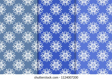 Set of floral ornaments. Blue vertical seamless patterns. Wallpaper backgrounds
