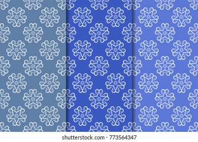 Set of floral ornaments. Blue vertical seamless patterns. Wallpaper backgrounds