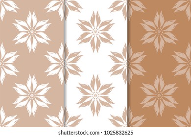 Set of floral ornaments. Brown, beige and white seamless patterns for textile and wallpapers
