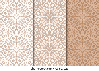 Set of floral ornaments. Brown, beige and white seamless patterns for textile and wallpapers