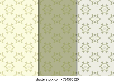 Set of floral ornaments. Set of olive green vertical seamless patterns. Wallpaper backgrounds