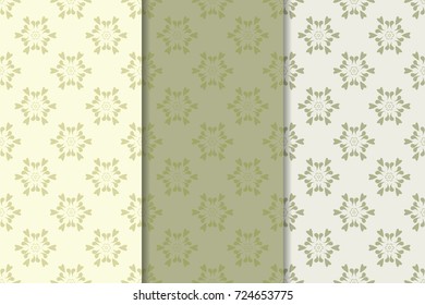 Set of floral ornaments. Set of olive green vertical seamless patterns. Wallpaper backgrounds