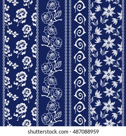 Set of flourish batik bohemian borders. Damask seamless pattern, leaves stripes, gypsy and ethnic motifs. Ethnic textile collection. White on dark blue.