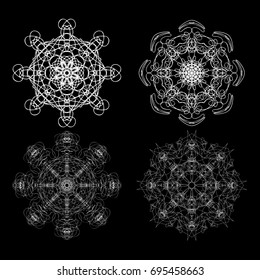 Set of flower mandalas in black and white. Hand drawn sacred geometry mandala background. Seed of life symbols. Vector.