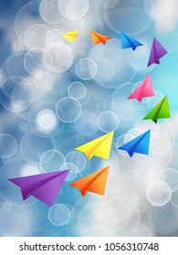 Set of flying color paper planes in the blue sky with twinkle lights  background. Influencer, KOL, key opinion leadership concept