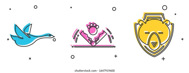 Set Flying duck, Trap hunting and Bear head on shield icon. Vector