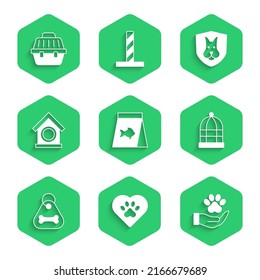 Set Food for fish, Heart with animals footprint, Hands, Cage birds, Dog collar bone, house, Animal health insurance and Pet carry case icon. Vector