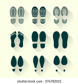 Set of footprints and shoes in a flat design