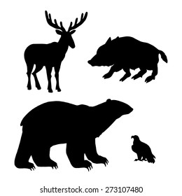 Set of forest animals silhouettes. Bear, wild boar, eagle, deer. Vector illustration.