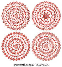 Set of four 4 ethnic red design elements isolated on white background. Winter nordic round pattern borders in collection. Vector illustration. Could be used for web-design, decoration, etc. 