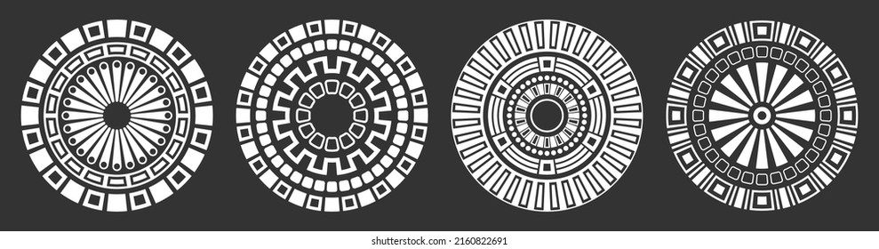 Set of four abstract circular ornaments. Decorative patterns isolated on black background. Tribal ethnic motifs. Stylized sun symbols. Stencil tattoo and prints Vector monochrome illustration.