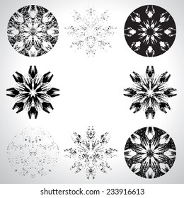 Set of four Abstract Snowflake Icons isolated on White Background. Decorative Elements. 