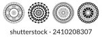 Set of four abstract symmetrical circular ornaments. Wheels. Rosettes of geometric elements. Tribal ethnic motif. Stencil tattoo and prints. Round  patterns. Decorative vector design elements.