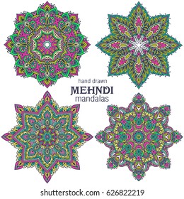 Set of four abstract vector round lace design mandalas, decorative elements. Mehndi style, traditional oriental ornament. Illustration for print, tattoo