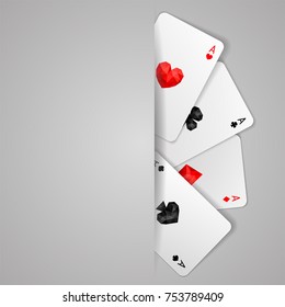 Set of four ace playing cards suits. Winning poker hand with copy space/ Gray background