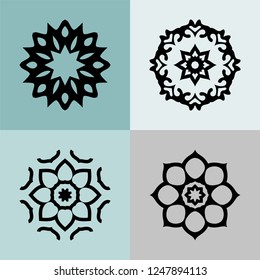 Set with four beautiful Mandalas. Vector decorative elements for your design.  Flower, oriental patterns