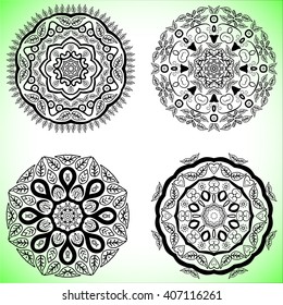 Set with four beautiful Mandalas. Vector ornaments, round decorative elements for your design