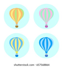 A set of four big colorful hot-air balloons isolated on a light blue background. Vector illustration. 