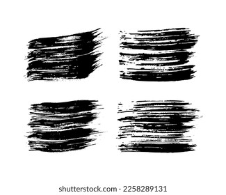 Set of four black brush strokes. Hand drawn ink spots isolated on white background. Vector illustration