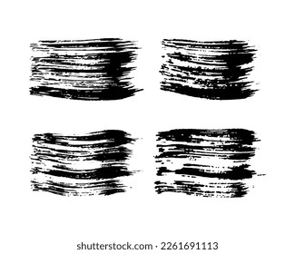 Set of four black brush strokes. Hand drawn ink spots isolated on white background. Vector illustration