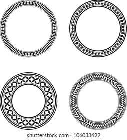 Set of four black circle design elements