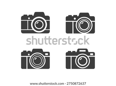 Set of four black flat icons representing classic digital cameras with different lens designs and body shapes for photographers and graphic designers projects