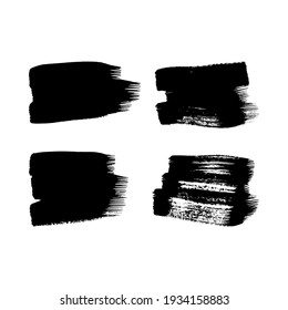 Set of four black grunge brush strokes. Painted ink smear. Ink spot isolated on white background. Vector illustration