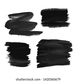 Set of four black hand drawn ink stains. Ink spots isolated on white background. Vector illustration
