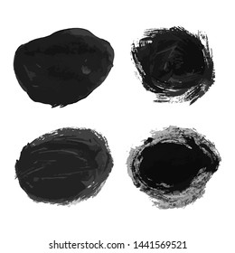 Set of four black hand drawn ink stains. Ink spots isolated on white background. Vector illustration