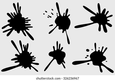 Set of four black ink splash.