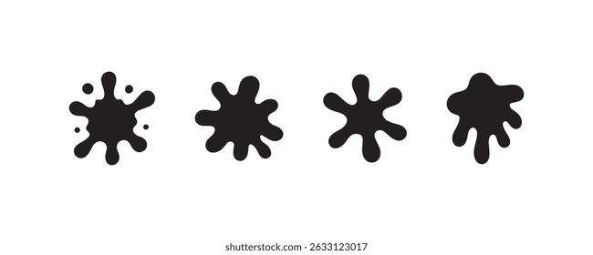 Conjunto de cuatro manchas de salpicaduras de tinta negra sobre fondo blanco.