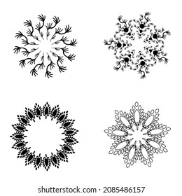 Set of four black round ornaments on a white background