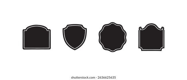 Set of four black silhouette shields and plaques on white background.