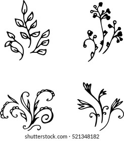 Set of four black stylized flower decorations