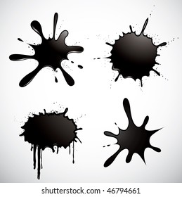 Set of four black vector ink spots