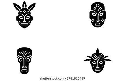 A set of four black and white African tribal masks with various shapes and decorative elements