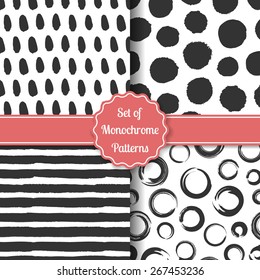 Set of four black-white stylish patterns. Monochrome geometric seamless patterns. Fashion grunge backgrounds. Vector illustration.